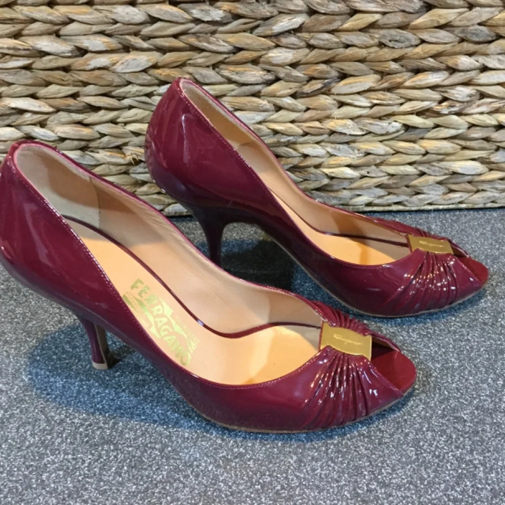 Salvatore Ferragamo Burgundy Patent Peep-Toe Heels with Gold Accent
